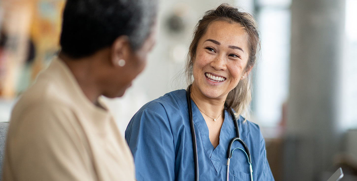 Homecare visit with elderly black woman