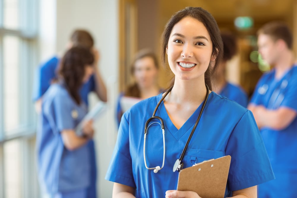 Medical student smiling at the camera at the university