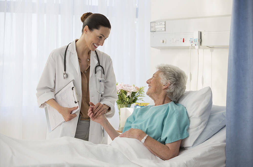 doctor-and-senior-patient-talking-in-hospital-room-v01