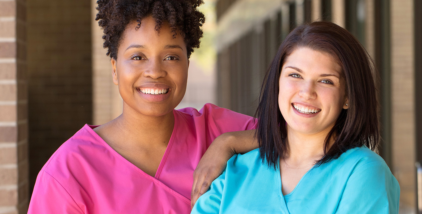 smiling female medical professionals