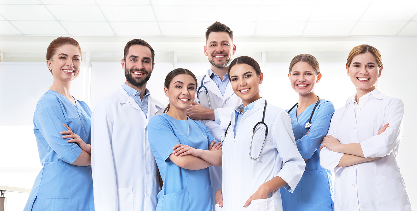 smiling group of nurses and doctors