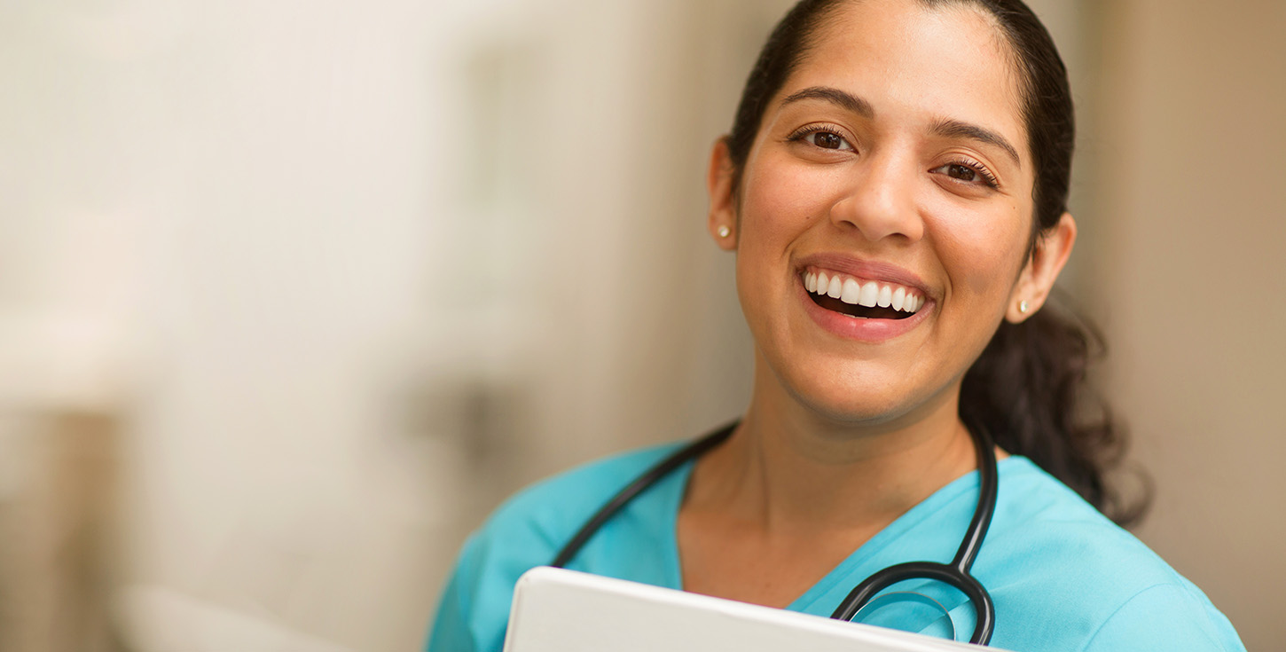 smiling hispanic female nurse